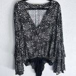 Free People  Intimately Ditsy Bell Sleeve Floral Bodysuit Black Combo Sz Medium Photo 1