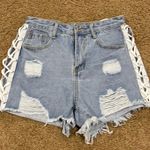 Distressed High Waisted Jean Shorts With Cut Out Tie Sides Blue Photo 0