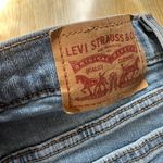 Levi's Distressed High Rise Denim Shorts in Sapphire Dust - Size 24, Medium Wash Photo 12