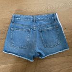 LF - Side Logo Tape Distressed Ripped High Waist Jean Shorts in Blue and White Photo 3