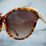 Alexander McQueen women’s AMQ 4241/S tortoise Havana gold cat-eye sunglasses Photo 4