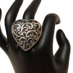 Silver filigree style heart shaped fashion… Silver Photo 1