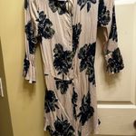 Free People Floral Wrap Romper with Navy and Cream Design Photo 1