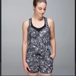 Lululemon  The Runsie Flowabunga Black Angel Wing Romper Photo 1
