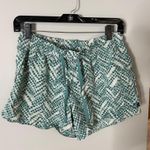 The North Face  Green White Athletic Shorts Geometric Logo Medium Excellent Condition Photo 0