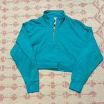 We Wore What  Teal Cropped 1/2 Zip Sweatshirt Photo 0