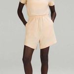 Lululemon  lightweight high neck open back romper in prosecco nwt size 8 Photo 0