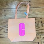 Clinique Macys  Large Shopping Shoulder Travel Orange Tote Bag With Pink C Logo Photo 0