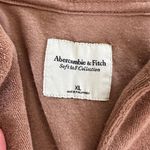 Abercrombie & Fitch Cropped Terry Button Front Shirt in Tan Photo 1