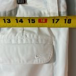 Nike  Women’s Dri-Fit White Golf Pants. size 12. zippered side pkts. EUC Photo 7