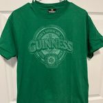 Guinness  green short sleeve shirt size medium Photo 0