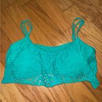 Jessica Simpson  Women’s Large Bikini Top Adjustable Straps teal Flowy cut out Photo 0
