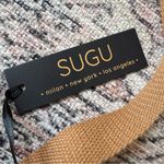 NWT SUGU Milan New York Los Angeles Sling Tan Crossbody Bag Unisex Chest Bag Photo 1