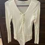 Joyce Leslie Bodysuit Photo 0