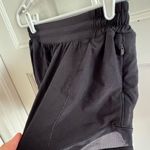 Lululemon  On The Fly black shorts size 4 Tall Photo 5