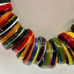 Colorful rings on fabric Indian necklace Photo 8