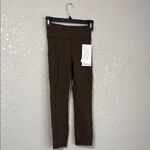 Lululemon Invigorate HR Crop 23” size 2 in dark olive Photo 3