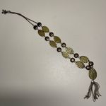 Beautiful Blank hammered coin necklace with tassel. Photo 0