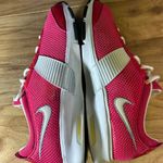 Nike  White and Yellow Athletic Shoes Photo 1