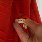 Sexy Black and Orange/Red crisscross back stretch knit dress. Photo 8