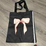 Black Tote Bag with Pink Bow Design Photo 2