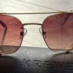 Krewe Sunglasses with Gold Frame and Pink Lenses Photo 0