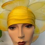 Handmade yellow floral hat. This hat was made for the stage in the theater. Photo 2