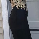 PromGirl Black And Gold Prom Dress Photo 1
