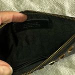 Michael Kors  Womens Saffiano Leather Stud Long Zip Clutch with gold tone studs. Photo 10