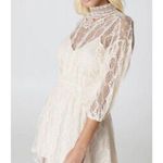 Free People  Cream Half Sleeve Lace Mini Dress With Open Back Photo 0