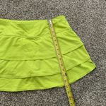 Athleta  neon yellow mini tennis skirt size M Photo 7