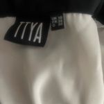 Women's Black and White Button Photo 9