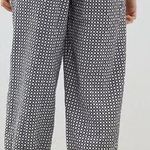 Anthropologie Ollari  Women's Tasseled Joggers Size Large Black & White Photo 1