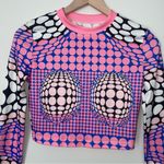 Trendingā Dynamic Polka Dotted Long Sleeve Crop Top Pink Photo 1
