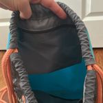 Adidas  Unisex Rumble II Sackpack, Onix Jersey/Bright Cyan/Onix/Chalk Cora Photo 4