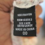 Torrid geometric design flowy top strappy back blouse in cream, pink and black size 00 (M/L,10). Photo 9