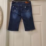 Doll houses Stylish Distressed Blue Jeans are a junior size 3. Photo 8
