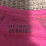 New Balance  women’s running shirt. Size medium Photo 4