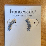 Francesca’s signature silver daisy earrings Photo 0