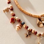 Free People  Chic Gold and Tan Beaded Necklace Photo 1