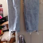 American Eagle  Outfitters mom jean ripped distressed denim in light wash blue size 2. Photo 7