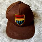 Brown explore trucker hat Photo 0