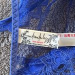 Free People bralette. Size Small. Blue lace with velvet straps. Like new. Photo 3