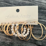 Elegant Gold and Pearl Hoop Earring Set Photo 0