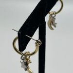 1/2” Gold Tone Hoops with Mixed Tone Star and Moon (silver stars/gold moons) Photo 1