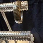 Elegant Gold Bracelet with Intricate Textures Photo 9