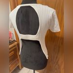 Isalis  Ribbed top curved hem cut out back size medium Photo 6