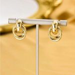 Gold Circle Knot Earrings Photo 4
