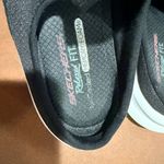 Skechers  Men's Black and White Slip-On Loafers Photo 4