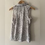 Nike  Dri Fit Printed Sleeveless Golf Polo Women's White and Black Dotted Pattern Photo 4